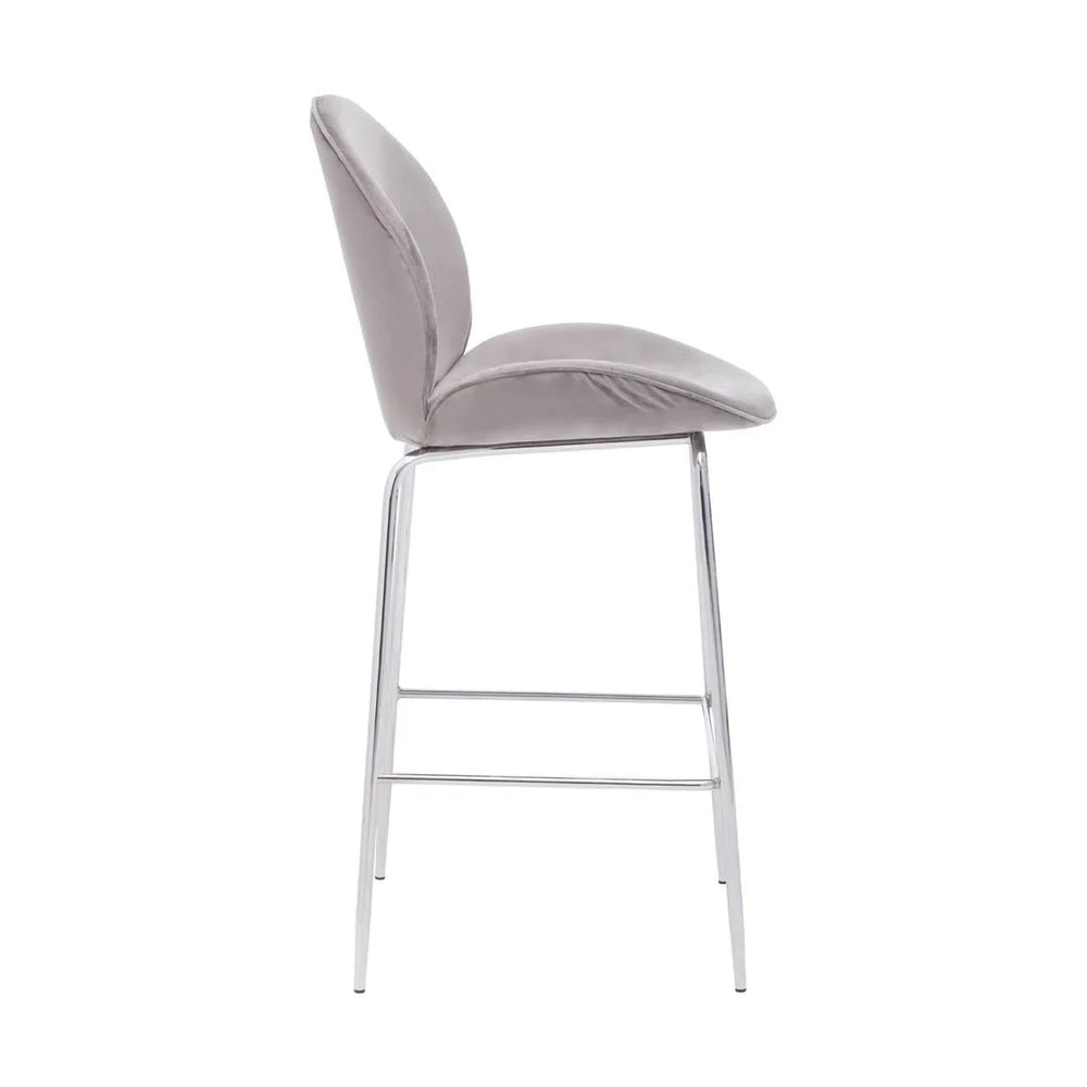 Grey velvet bar stool with chrome legs shown in side profile