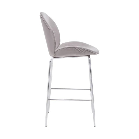 Grey velvet bar stool with chrome legs shown in side profile
