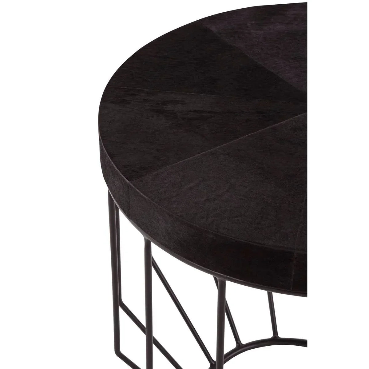 Round black wood side table with geometric metal base, close-up view of top and legs