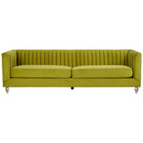 Three-seat sofa upholstered in vibrant green velvet, featuring a channel-tufted design on the backrest and seat cushions. The sofa has sleek, silver metal legs that elevate it slightly off the ground, adding a modern touch to its overall aesthetic