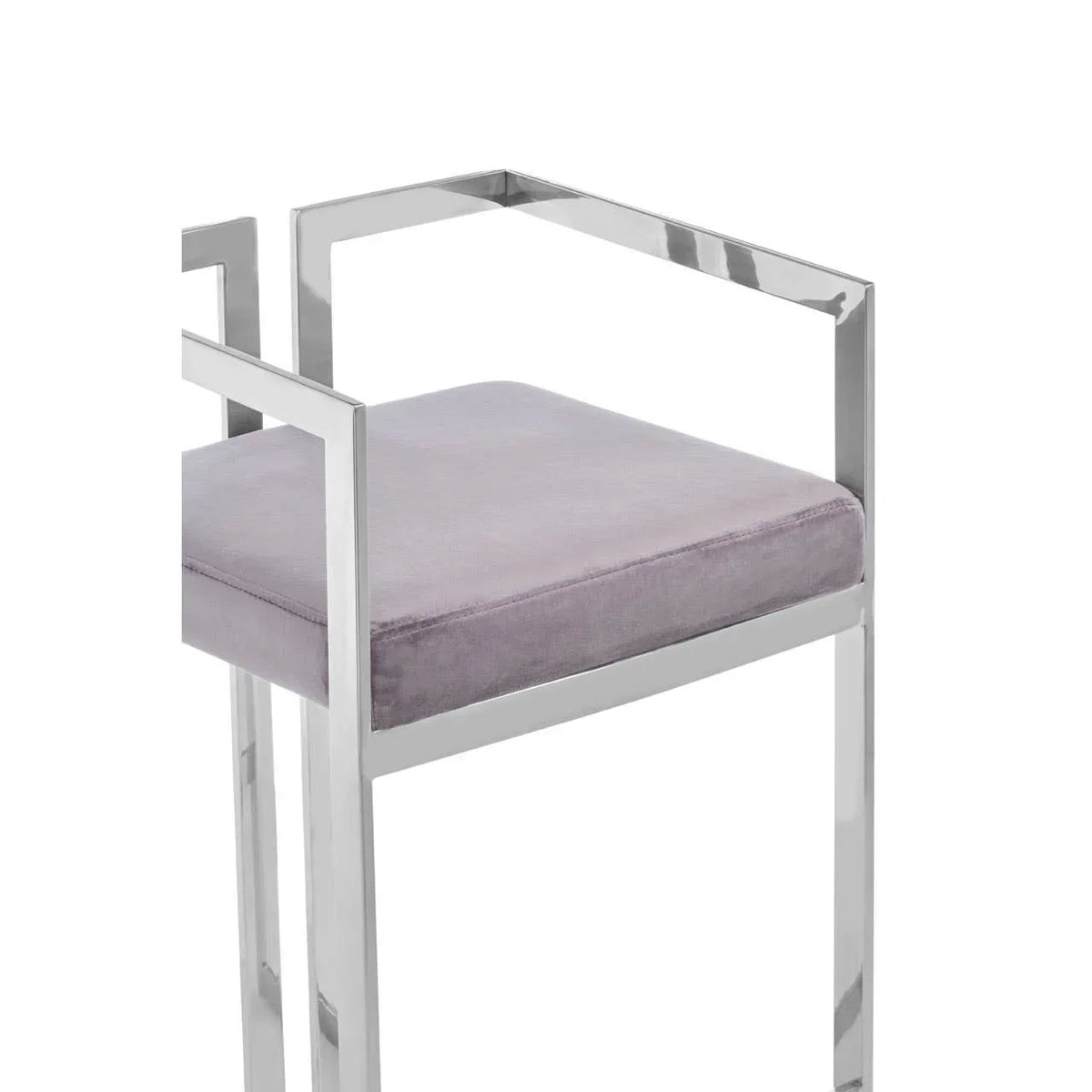 Modern bar stool with chrome frame and grey velvet seat, angled armrest detail visible