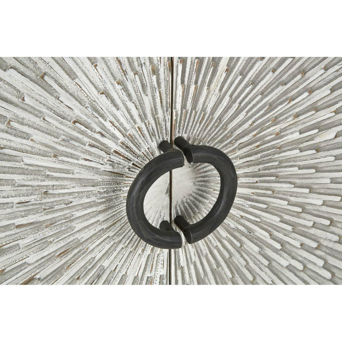 Textured wood cabinet doors with black circular metal handles and sunburst pattern