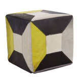 A geometric design pouffe featuring a combination of yellow, gray, black, and cream leather panels, showcasing a cube shape with distinct color blocks and a textured surface