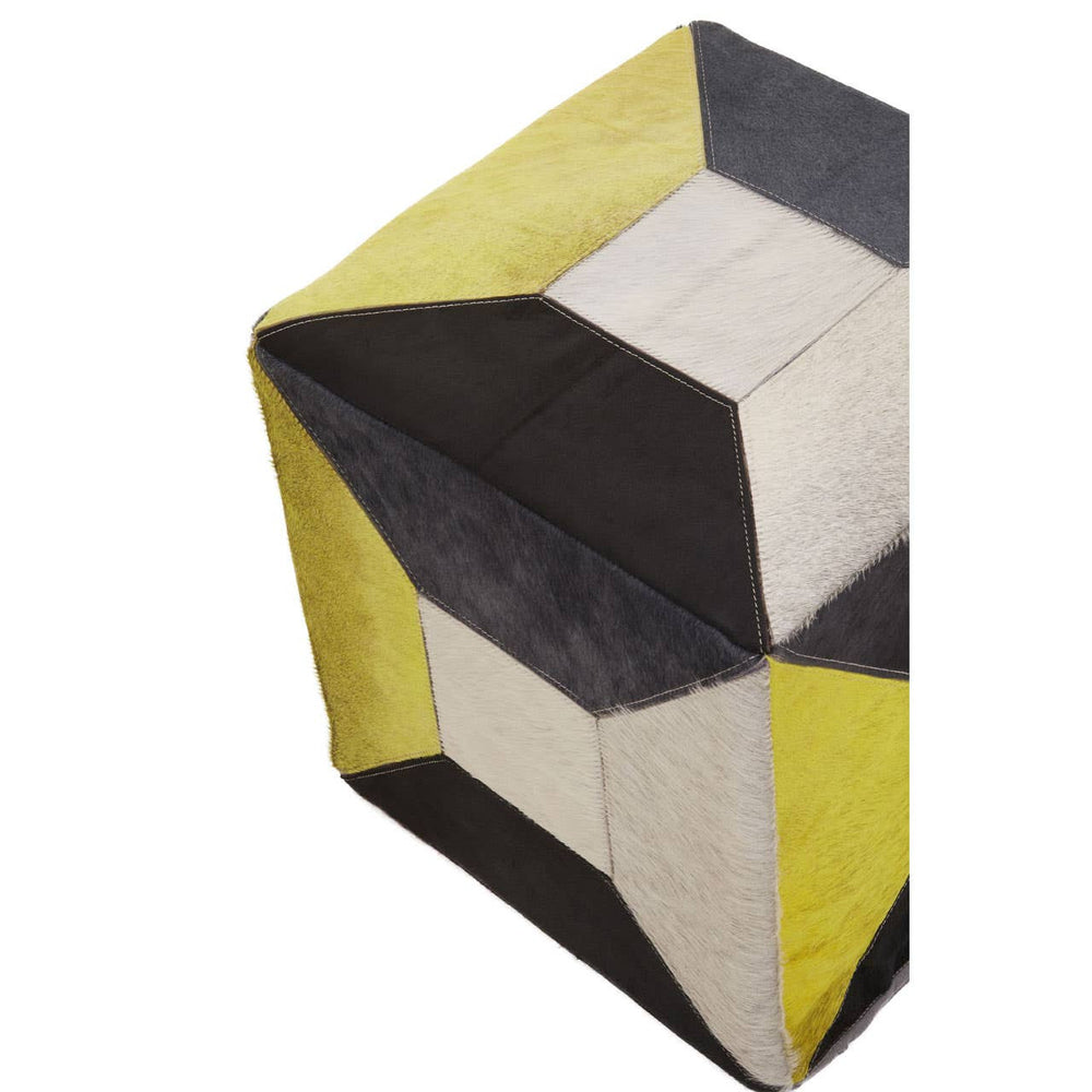 Geometric pouffe featuring a combination of yellow, black, and cream leather panels arranged in a modern design, showcasing a textured surface and a cube shape