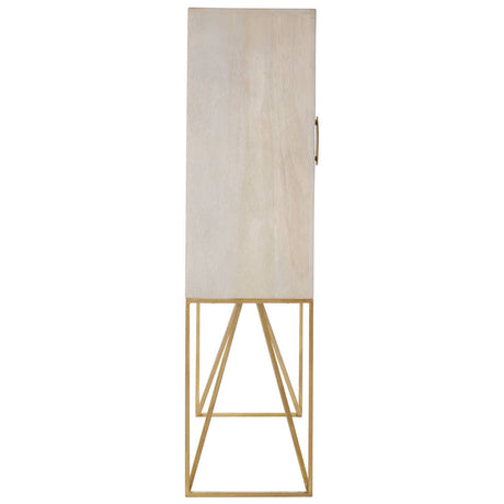 Tall cabinet made of white wash mango wood with a smooth surface and a single door, featuring a minimalist design. The cabinet stands on a sleek, gold metal frame with angled legs, creating a modern aesthetic suitable for home decor