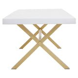 Square dining table featuring a white wash mango wood top and a modern, crossed gold metal base, designed for a contemporary aesthetic