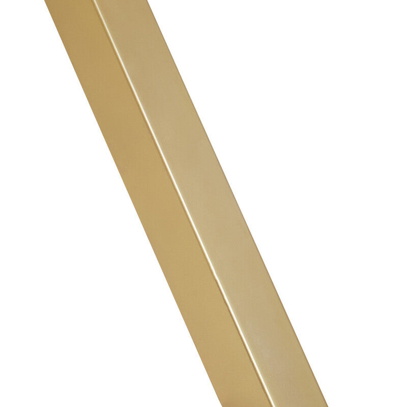 Close-up view of a tapered leg of a dining table made from white wash mango wood, showcasing a smooth finish and natural wood grain texture