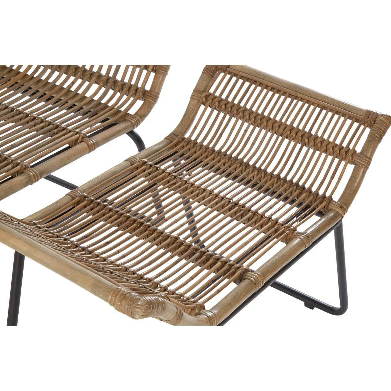 Closeup of rattan chair seat with natural woven design and black metal legs