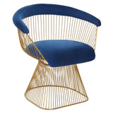 Blue velvet accent chair with gold metal wire frame and curved backrest