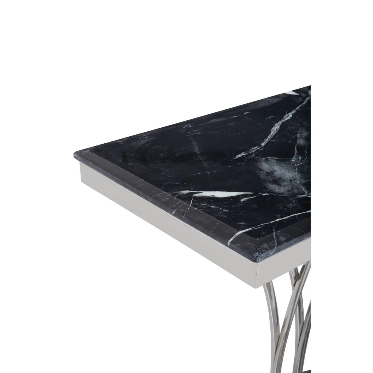 Black marble dining table corner with silver metal base detail