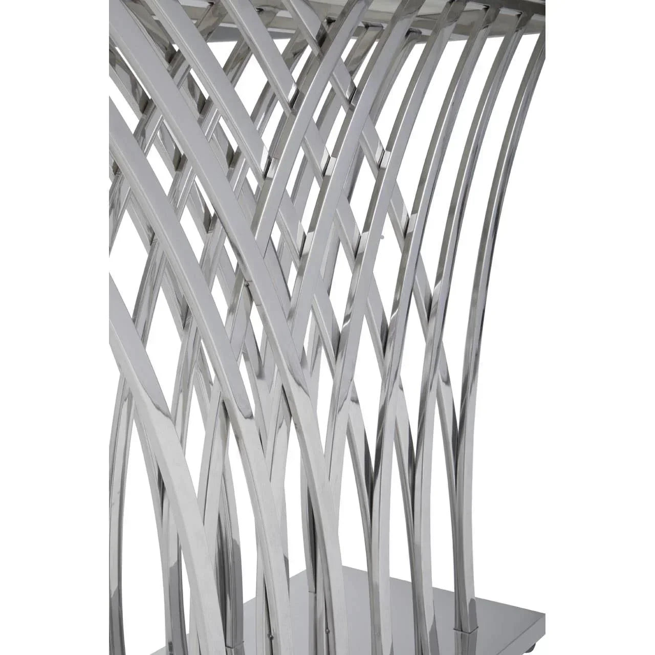 Close-up of chrome dining table base with modern interwoven metal design