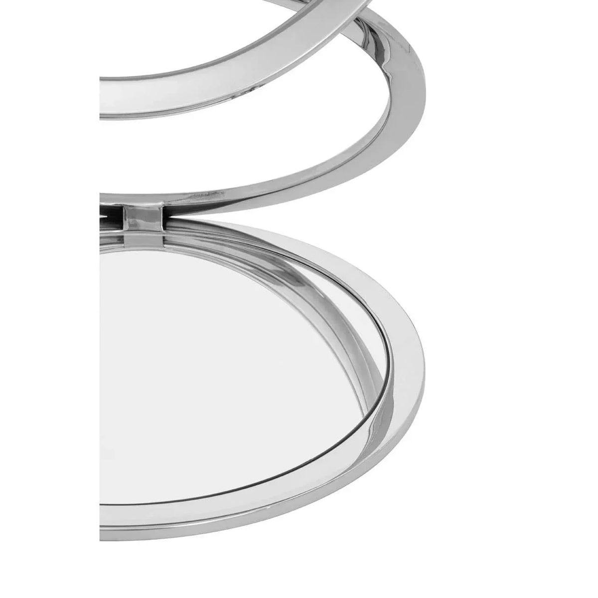 Close-up of round chrome bathroom mirror with swivel hinge