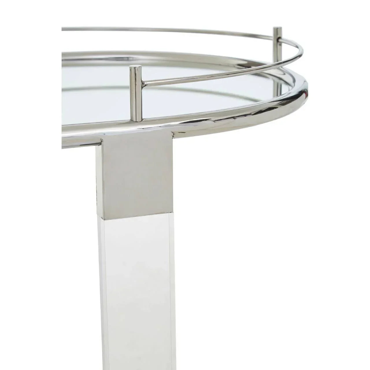 Chrome and glass side table corner with metal frame and circular rail detail