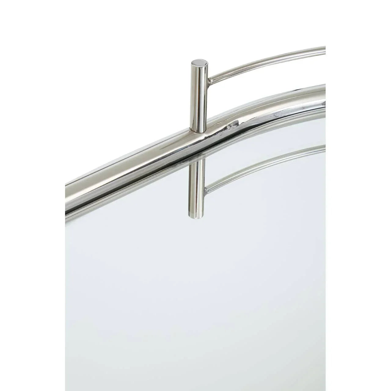 Closeup of chrome metal mirror frame with curved bar detail