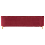 Three-seat sofa upholstered in rich wine-colored velvet, featuring a sleek, modern design with rounded edges and gold metal legs for an elegant touch