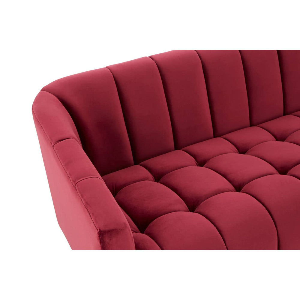 A close-up view of the Bella 3 Seat Wine Velvet Sofa, showcasing its plush, tufted upholstery in a rich wine color, with a curved backrest and soft, inviting cushions