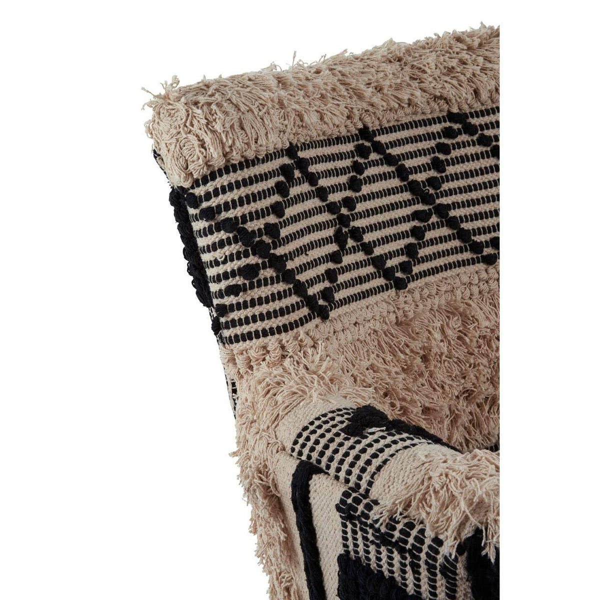 Textured armchair closeup with beige and black woven geometric upholstery