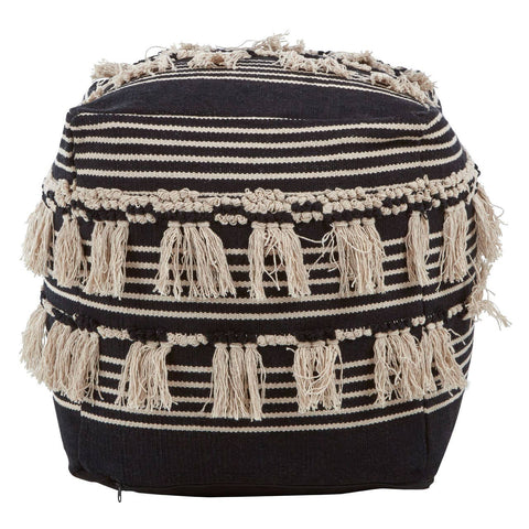 Round pouffe featuring a black and white shaggy design with textured fringes. The pouffe has a cylindrical shape and is adorned with horizontal stripes of varying thickness in black and cream colors