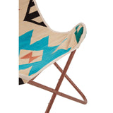 Multicolour butterfly chair featuring a patterned fabric with geometric designs in turquoise, black, and orange, supported by a sturdy brown metal frame. The chair's unique shape and vibrant colors make it a stylish addition to any home decor