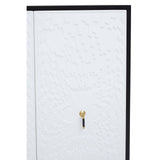 A close-up view of the Dumas Black and White Two Door Cabinet featuring a textured white door with a black frame and a gold handle. The cabinet has a modern design, emphasizing its sleek lines and contrasting colors