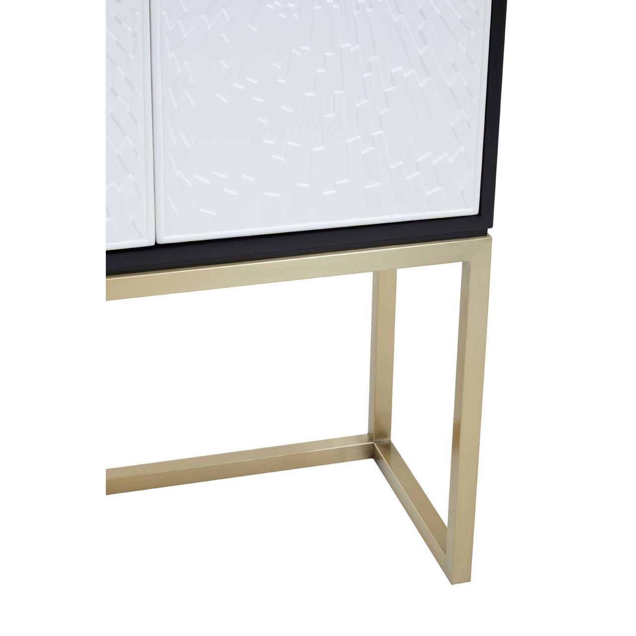 The Dumas Black and White Two Door Cabinet features a sleek design with a white textured surface and a contrasting black frame. It stands on a sturdy gold metal base, showcasing a modern aesthetic suitable for various home decor styles. The cabinet includes two doors, providing functional storage while enhancing the overall elegance of the piece