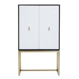 A two-door cabinet featuring a sleek black frame and white doors, with gold handles. The cabinet stands on slender gold legs, providing a modern and stylish look suitable for home decor