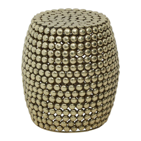 Gold finish stool and side table with a textured surface featuring a pattern of small, raised dots, creating a decorative and modern look. The piece has a cylindrical shape and is suitable for use as both a stool and a side table