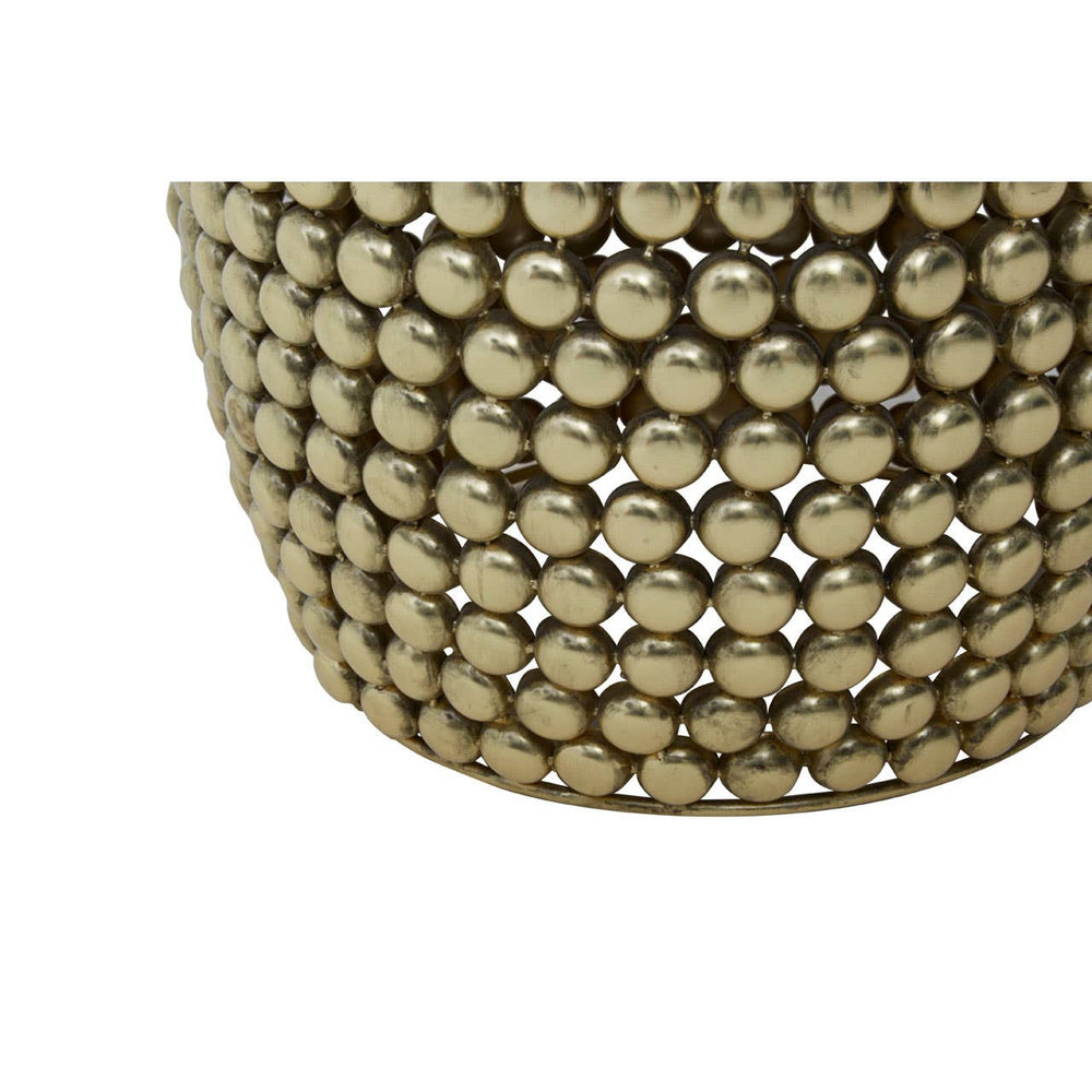 Gold finish stool and side table featuring a round, textured design made up of small, evenly spaced spheres. The surface has a shiny metallic appearance, reflecting light, and the overall shape is slightly curved at the top. The base is wider, providing stability