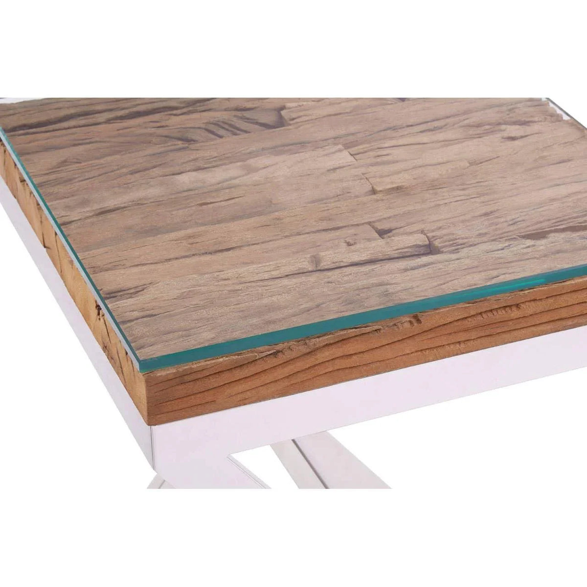 Close-up of wooden dining table top with glass overlay and white metal legs