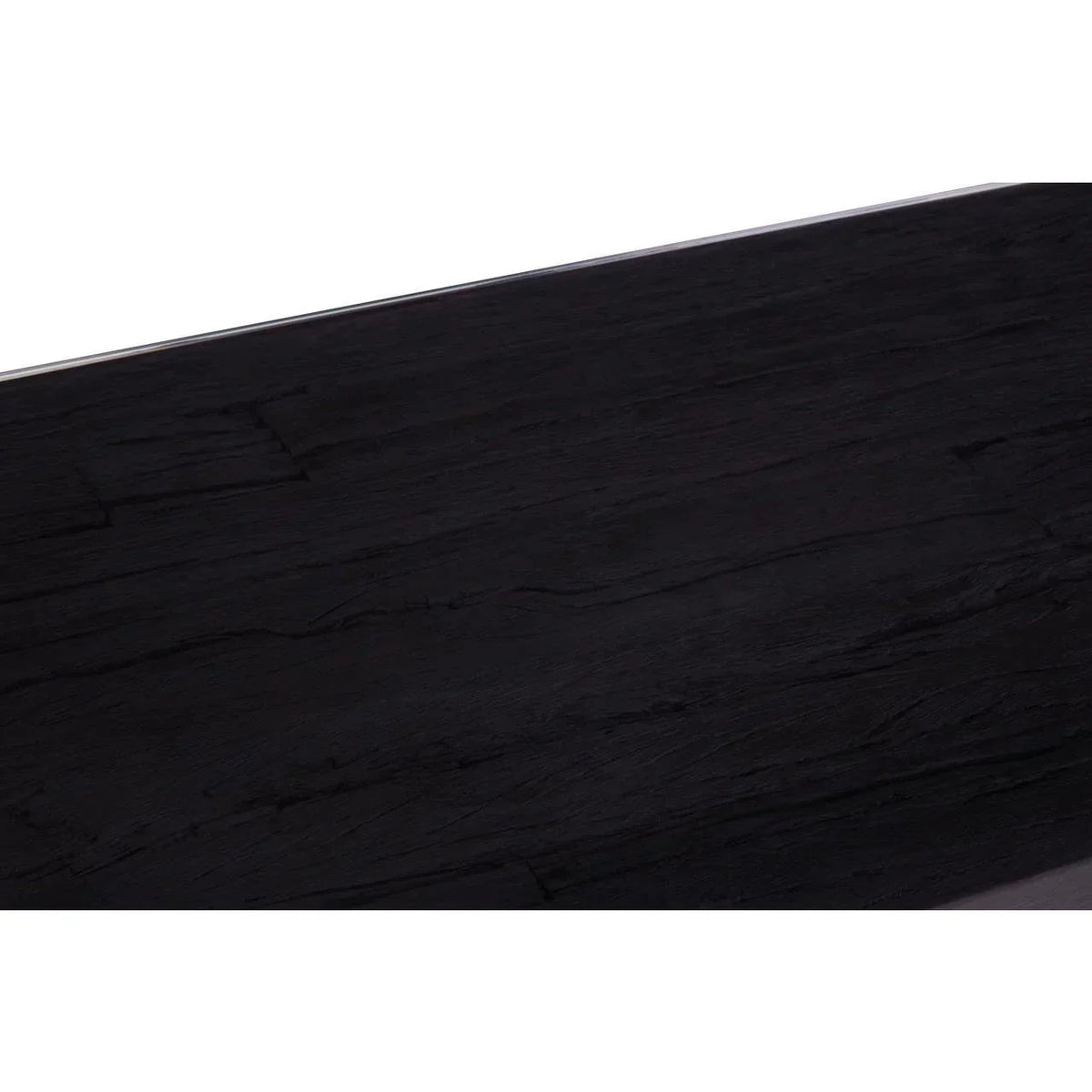 Closeup of black wood dining table top with textured grain finish