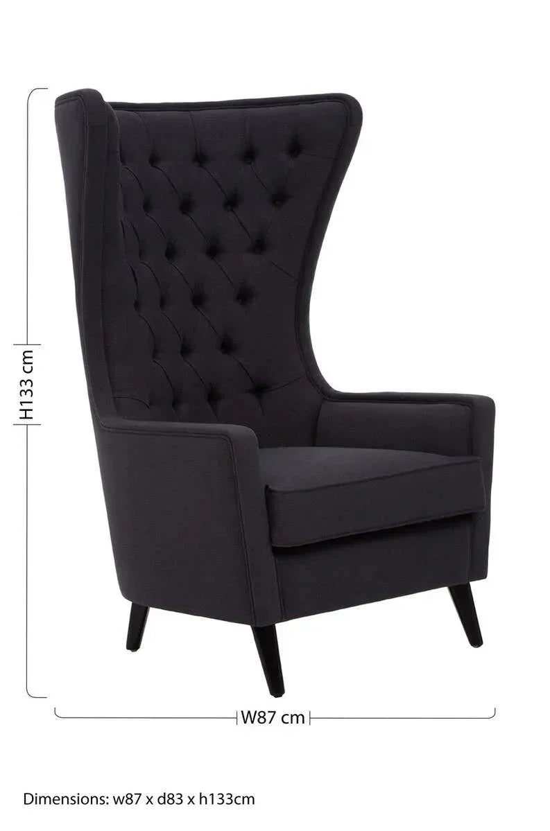 Black high back armchair with tufted upholstery and slim legs, dimensions shown
