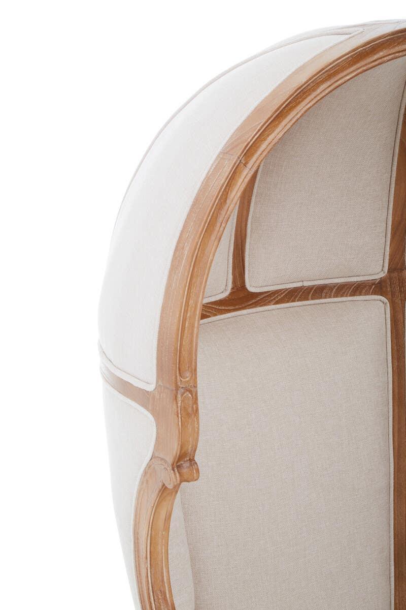 Curved wooden armchair with beige linen upholstery and dome backrest detail