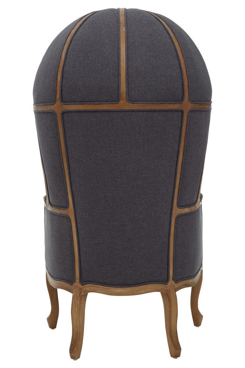 Back view of dome chair with dark grey upholstery and exposed wooden frame