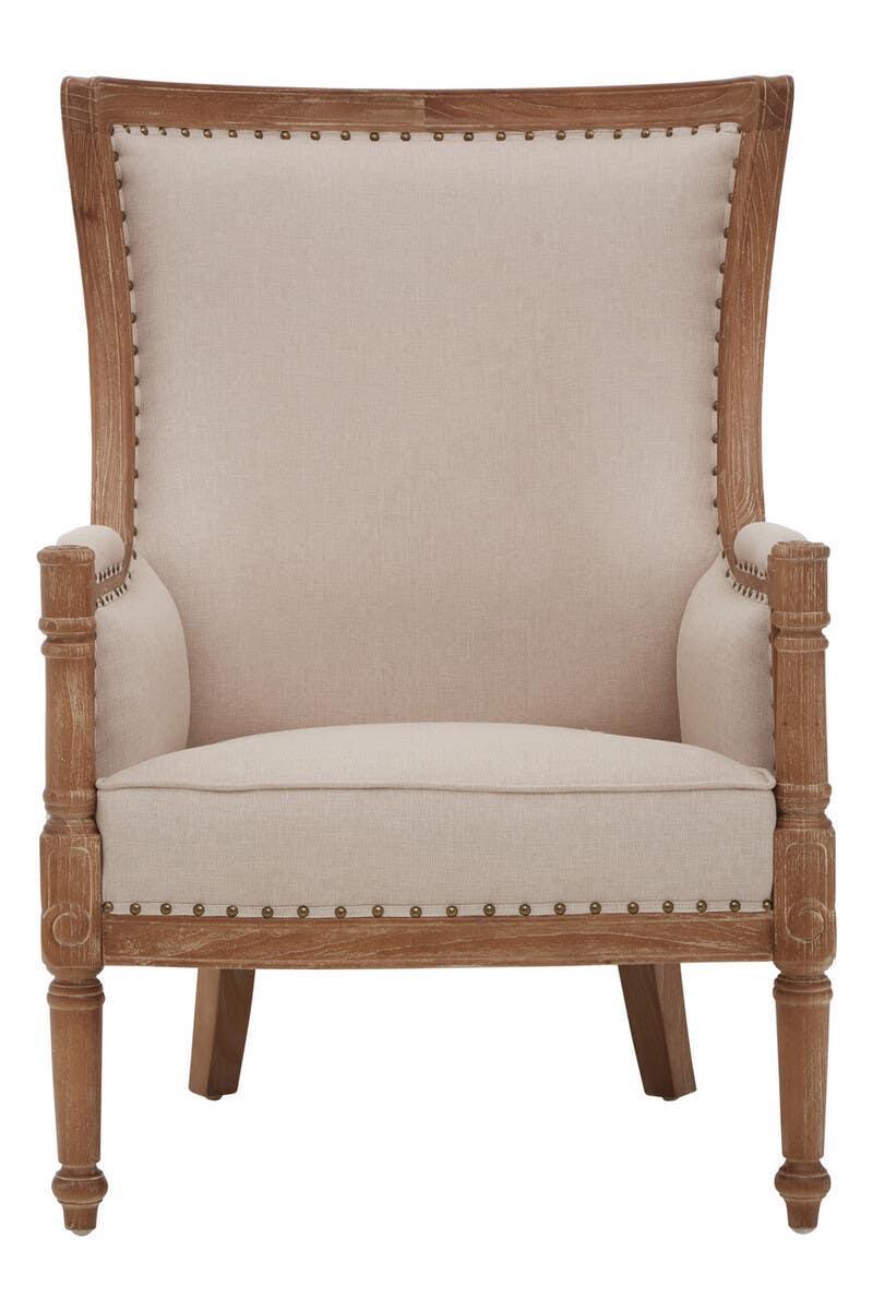Beige upholstered armchair with wooden frame and studded trim, front view