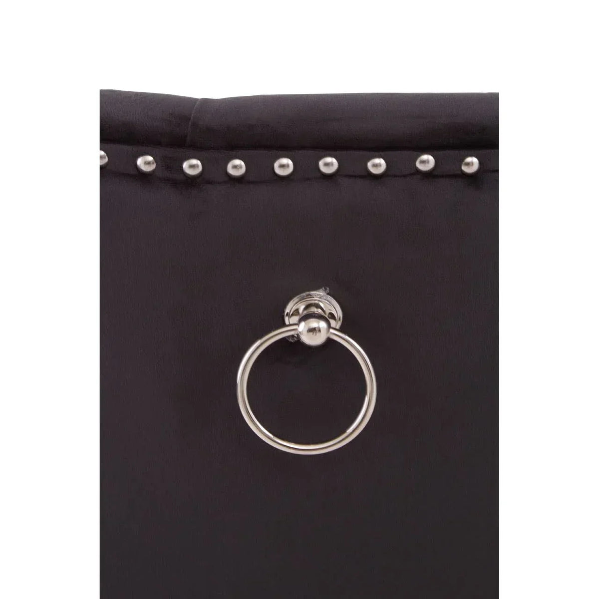 Black dining chair back with silver stud trim and chrome knocker handle detail