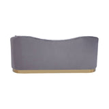 A three-seat sofa upholstered in soft grey pleated velvet, featuring a curved backrest and a sleek gold base. The design is modern and elegant, suitable for contemporary living spaces