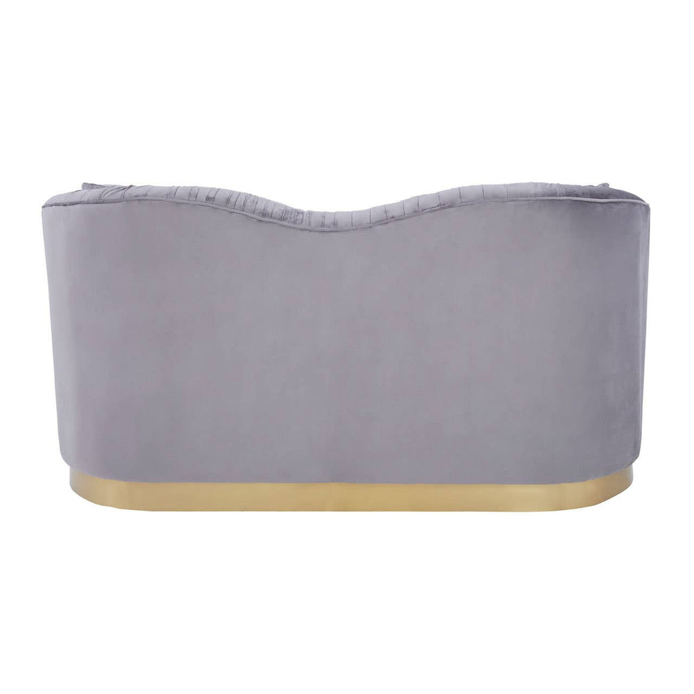Pleated grey velvet two-seat sofa with a curved backrest and a gold-colored base. The soft fabric has a luxurious sheen, and the overall design is modern and elegant