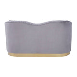 Pleated grey velvet two-seat sofa with a curved backrest and a gold-colored base. The soft fabric has a luxurious sheen, and the overall design is modern and elegant