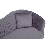 A close-up view of a grey pleated velvet sofa featuring a curved backrest and a single matching cushion. The fabric has a soft, luxurious texture, and the pleats add a stylish detail to the design