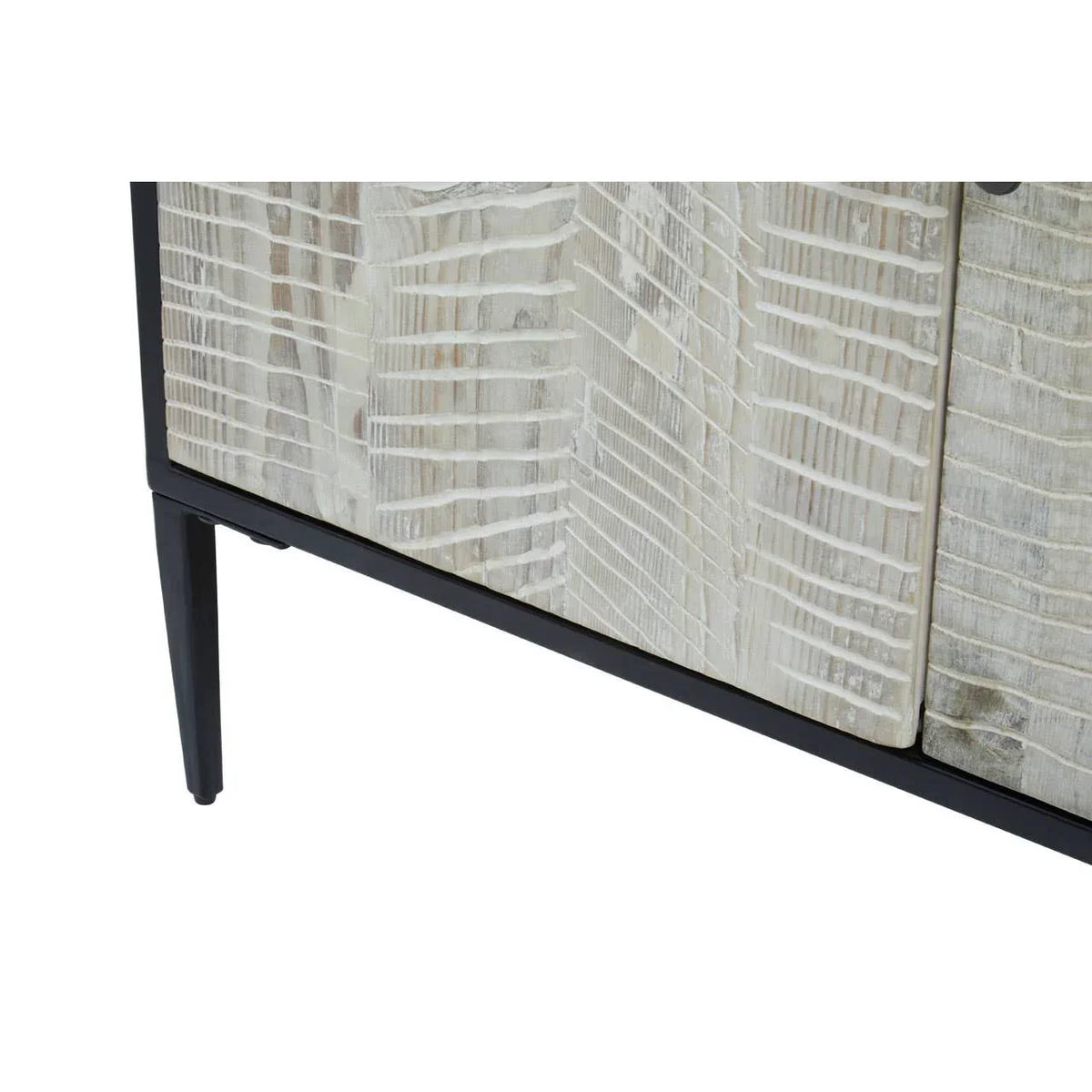 Textured wood sideboard with carved front panel and black metal legs, close-up view