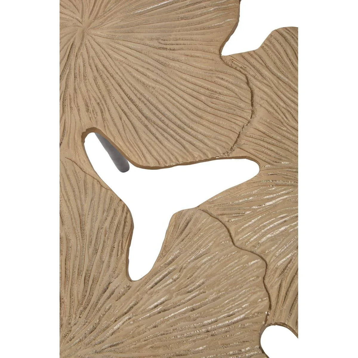 Gold metal side table with textured leaf pattern detail shown in close-up