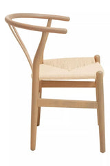 Lightwood dining chair with curved backrest and woven seat, side profile view