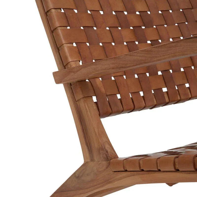 Brown leather woven lounge chair with wooden frame, close-up of seat and backrest detail