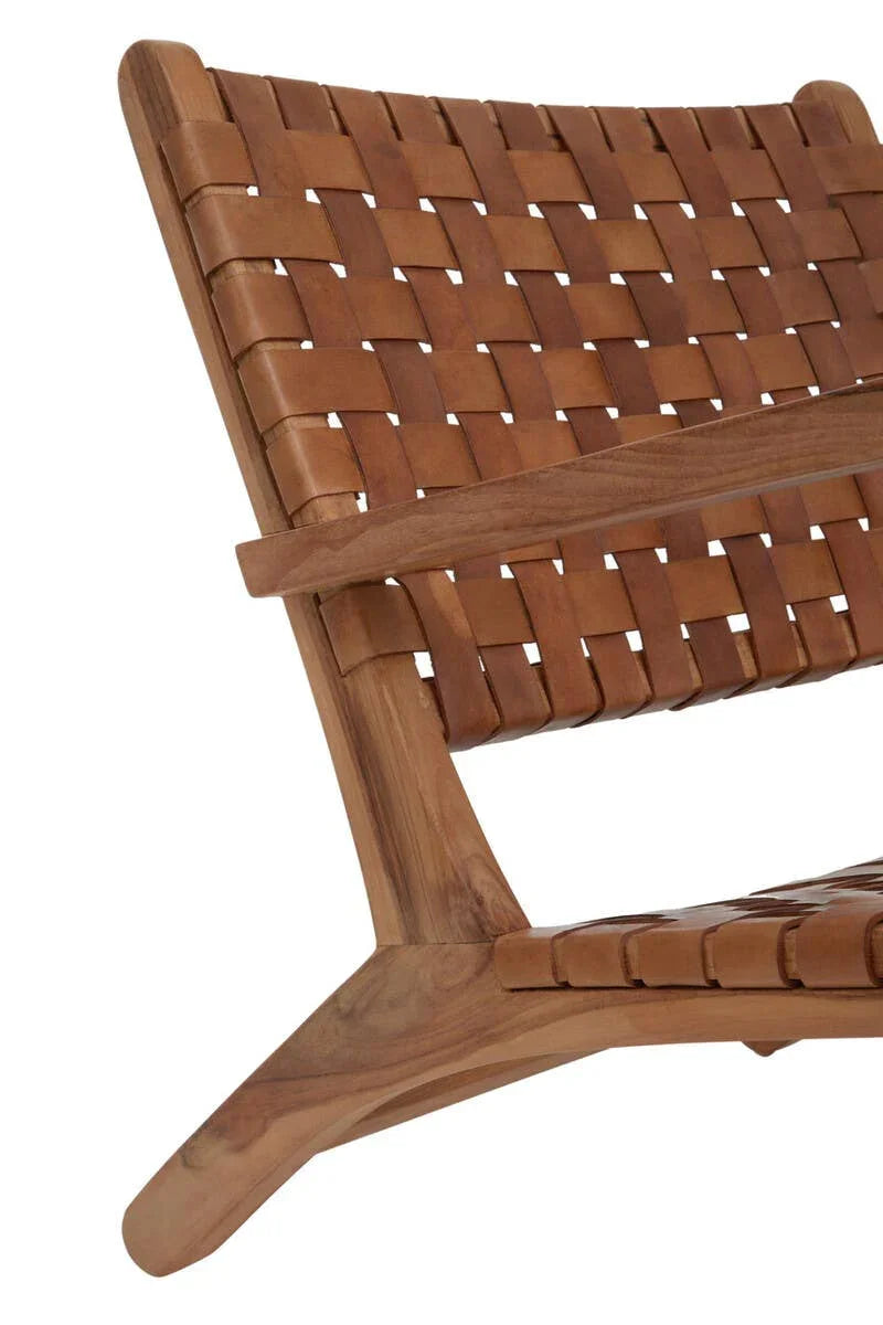 Brown leather woven lounge chair with wooden frame, close-up of seat and backrest detail