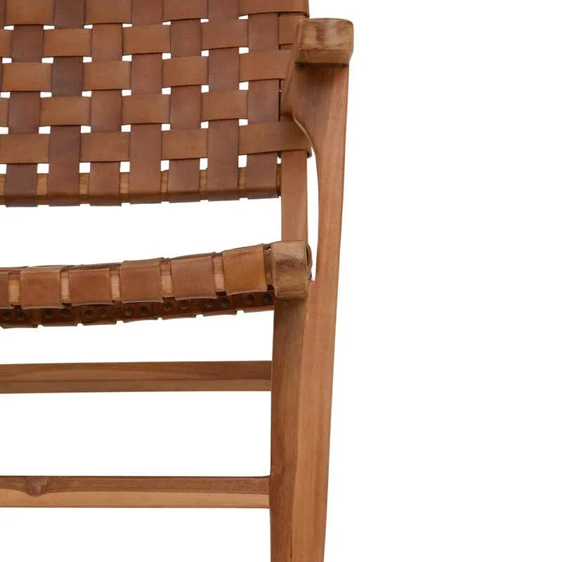 Closeup of woven leather lounge chair seat and armrest in natural wood finish