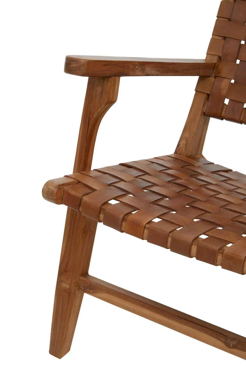 Close-up of wooden armchair with woven leather seat and backrest