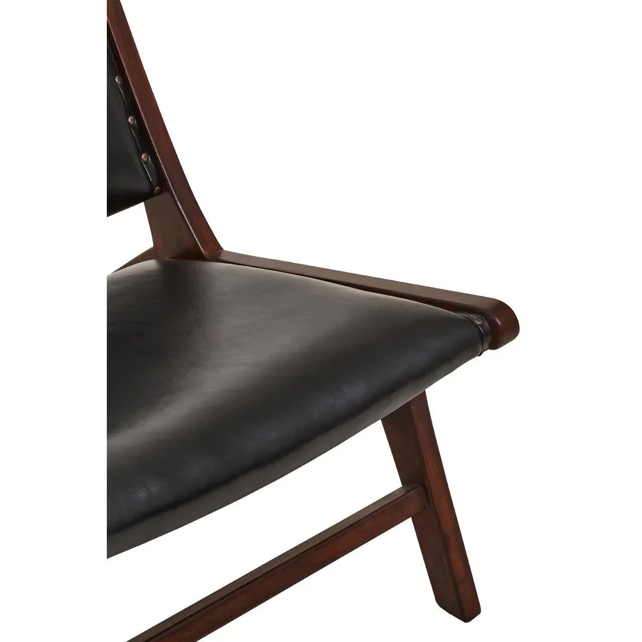 Close up of dark wood dining chair with black leather seat and angled legs