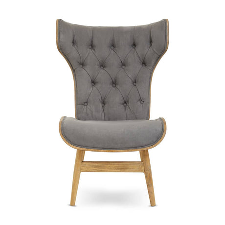 Dark grey velvet chair featuring a winged back design with tufted detailing.