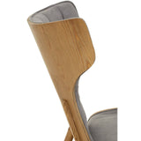 Dark grey velvet chair featuring a winged back design, complemented by a smooth wooden frame.