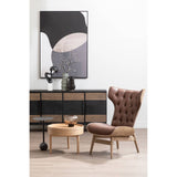 Brown leather effect chair with a winged back and tufted upholstery, featuring a light wood frame and legs.